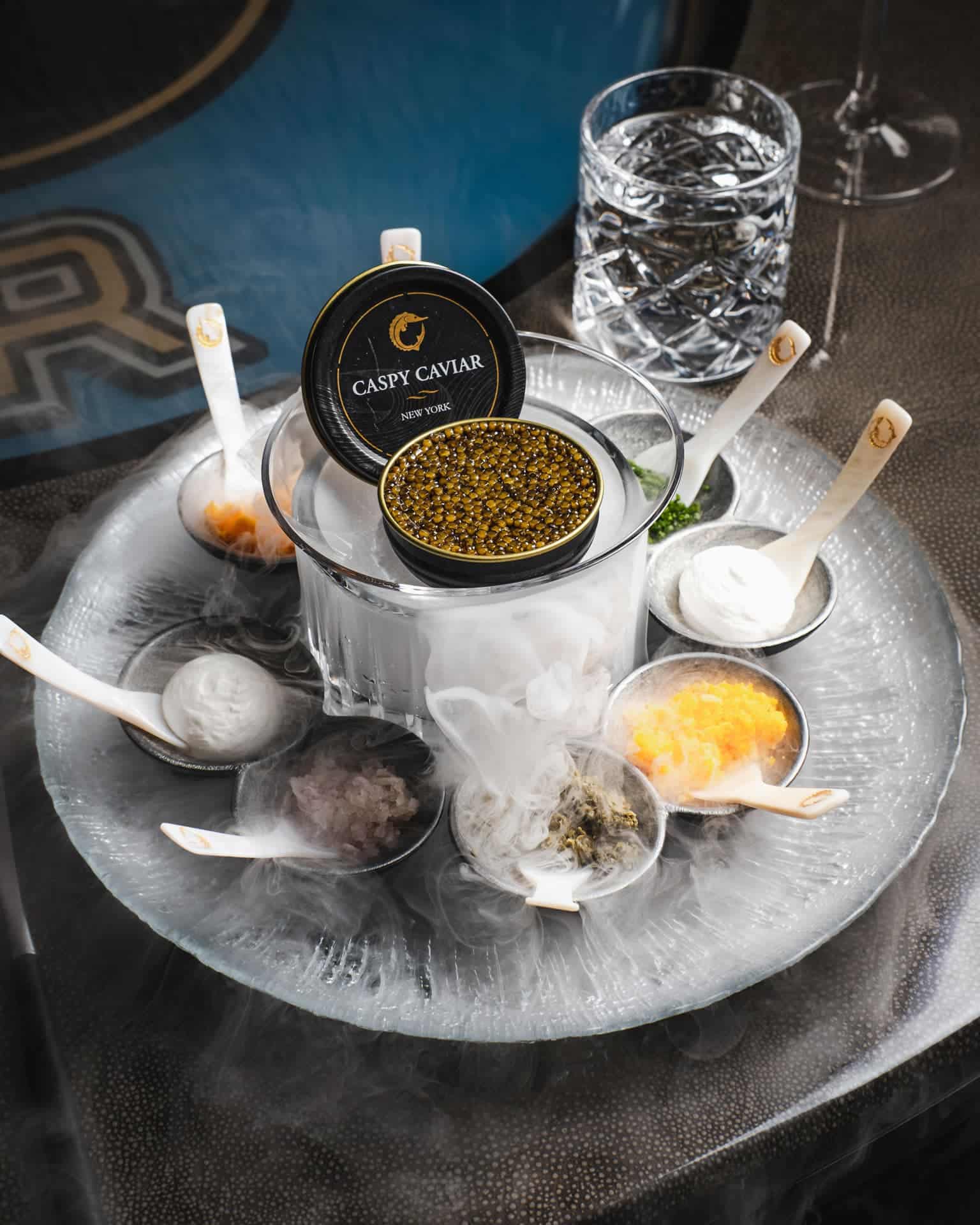 caspy caviar on a platter with dry ice