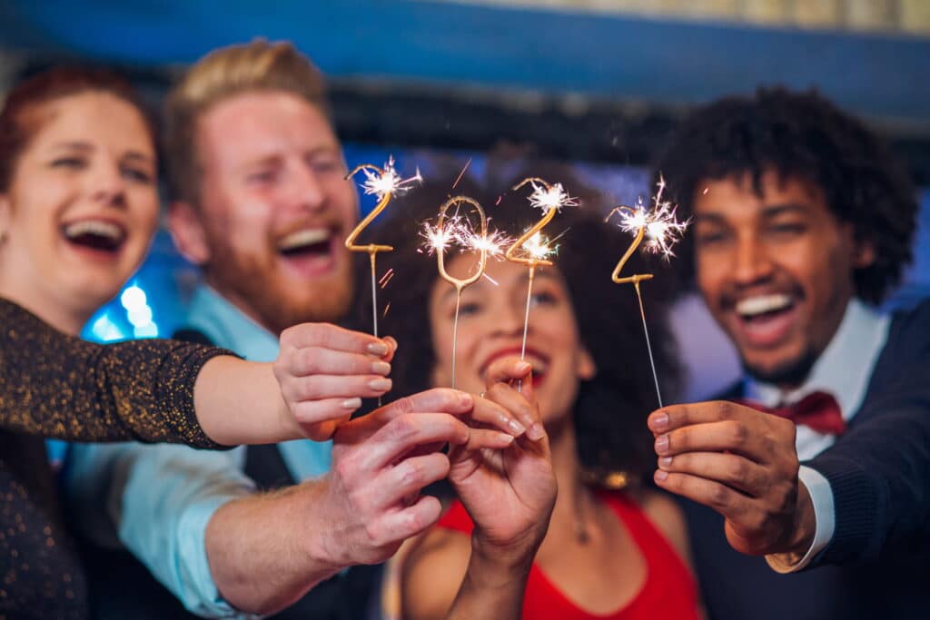 group of people celebrating the new year