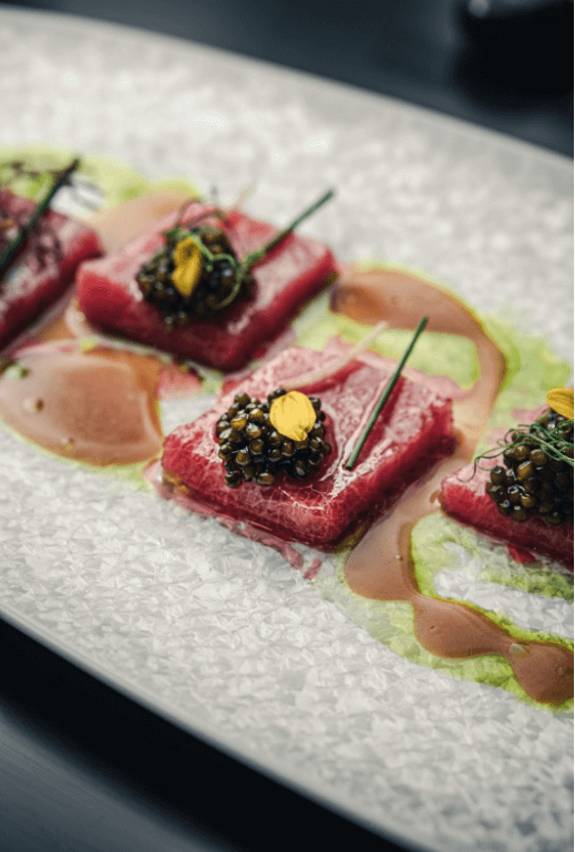 tuna with caviar on top of it